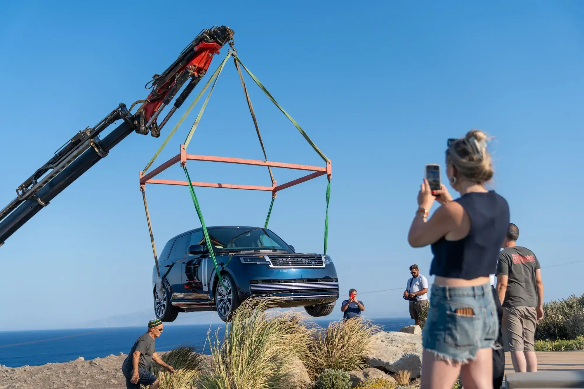 Installing display vehicles at the villa required cranes, precision, and deep local coordination